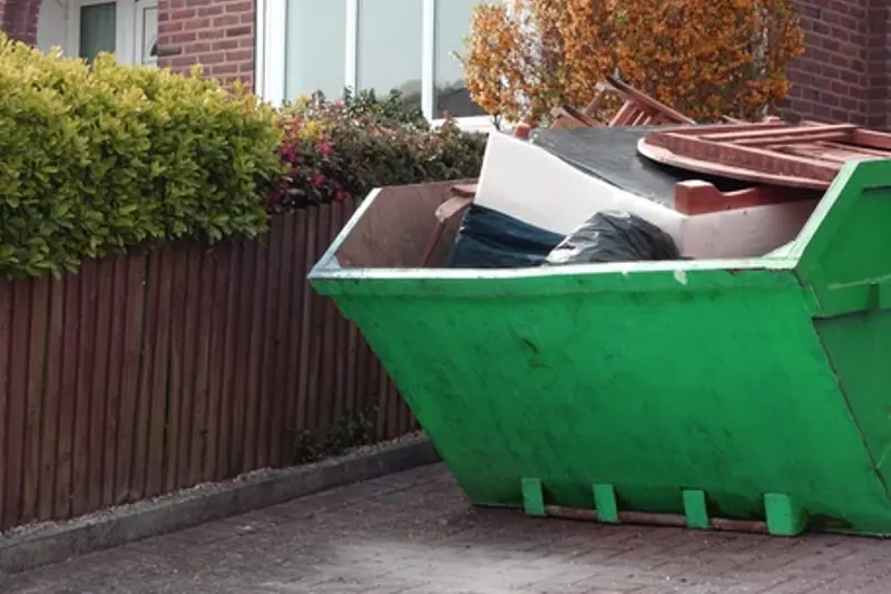 Full skip of mixed household waste, D J Recycling, West Sussex